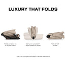 Cybex Mios/Coya Fold Lux Carry Cot in Cozy Beige, showing its folding features and compliance for carry-on travel.