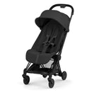 Cybex Platinum Coya stroller in matte black frame with sepia black lux seat, featuring a compact design and adjustable canopy.