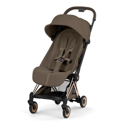 Cybex Platinum Coya stroller in rose gold frame with coconut brown seat, designed for easy maneuverability and comfort.