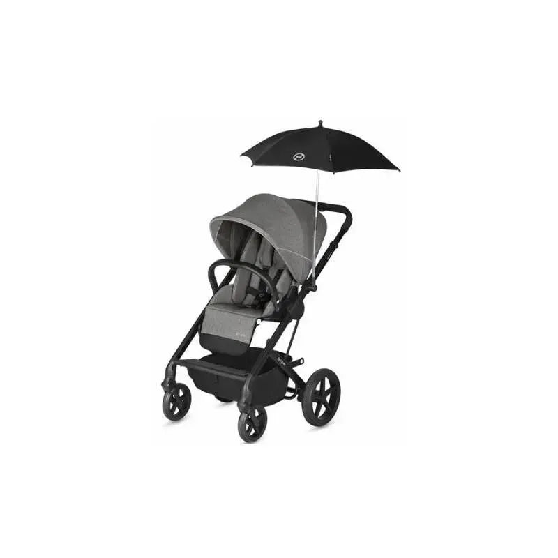 Cybex Platinum Stroller in black with adjustable parasol, featuring a reclined seat and safety harness.