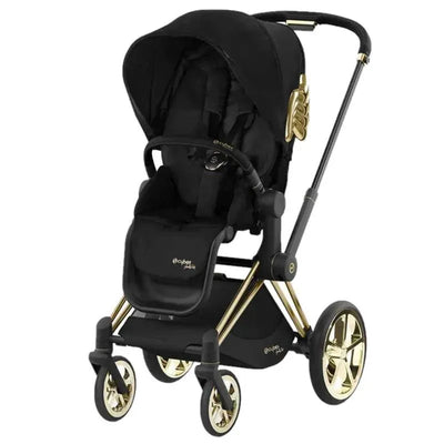 Cybex Priam 4 stroller by Jeremy Scott features a sleek black design with gold accents and a comfortable seat.