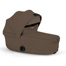 Cybex PRIAM Fold Lux Carry Cot in Coconut Brown, featuring a sleek design and a protective canopy for infants.