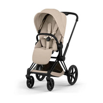 Cybex Priam stroller featuring a matte black frame and a cozy beige lux seat, designed for comfort and style.