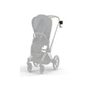 Cybex stroller cup holder in black, attached to the handle of a stroller, designed for holding beverages.