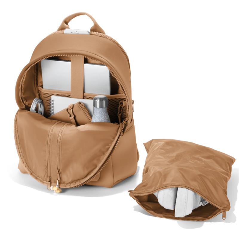 Large camel-colored Dagne Dover Dakota Backpack with an open design showing compartments for a laptop, water bottle, and accessories.