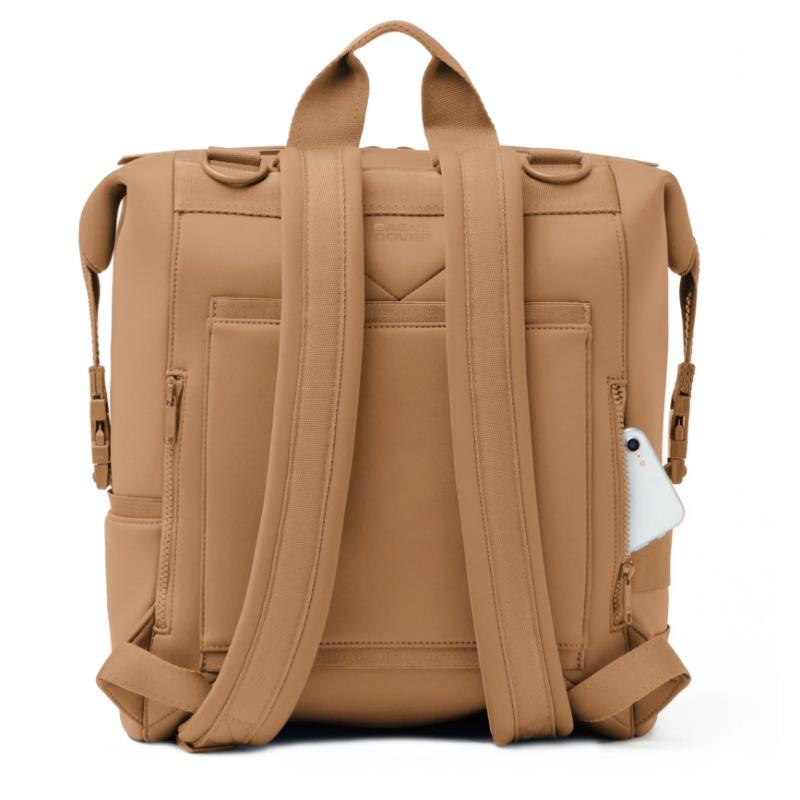 Large camel-colored Dagne Dover Indi Diaper Backpack featuring multiple compartments and shoulder straps.