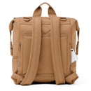 Large camel-colored Dagne Dover Indi Diaper Backpack featuring multiple compartments and shoulder straps.