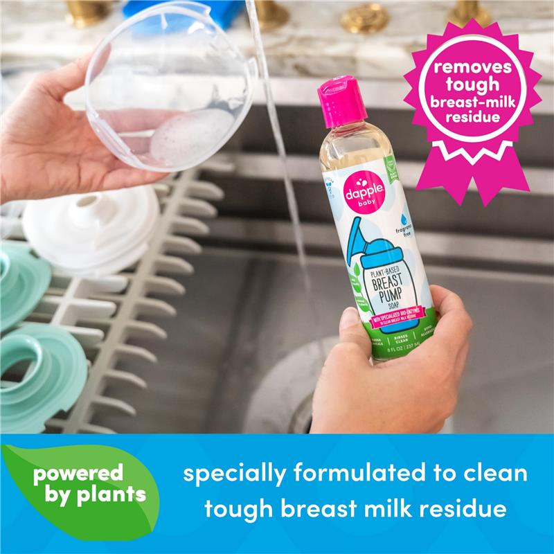 Dapple Baby Breast Pump Soap, 8 oz, in a hand with a pump attachment being rinsed in a sink, featuring a label stating it removes tough breast milk residue.