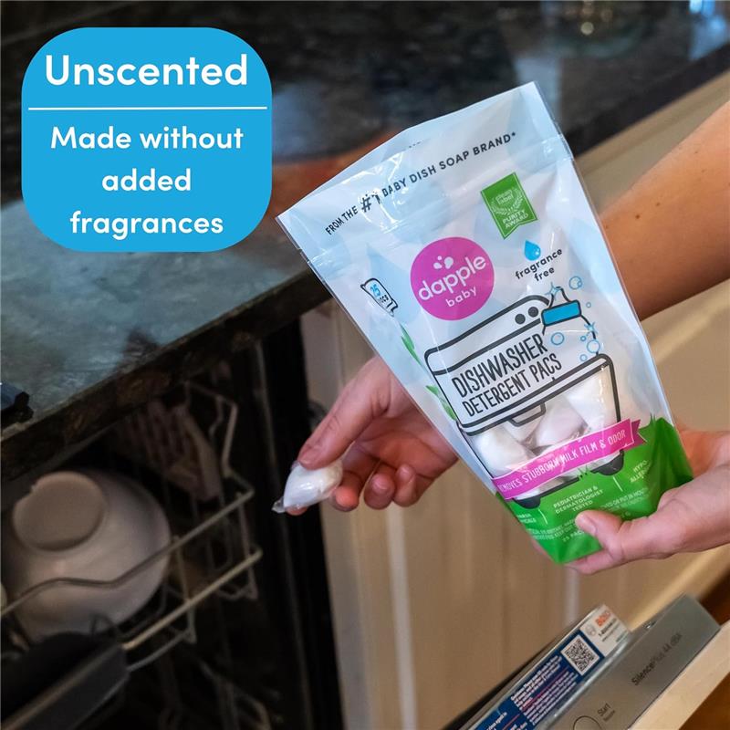 Dapple Baby Dishwasher Pacs packaging held by a person, highlighting its unscented, fragrance-free formula for baby dishware.