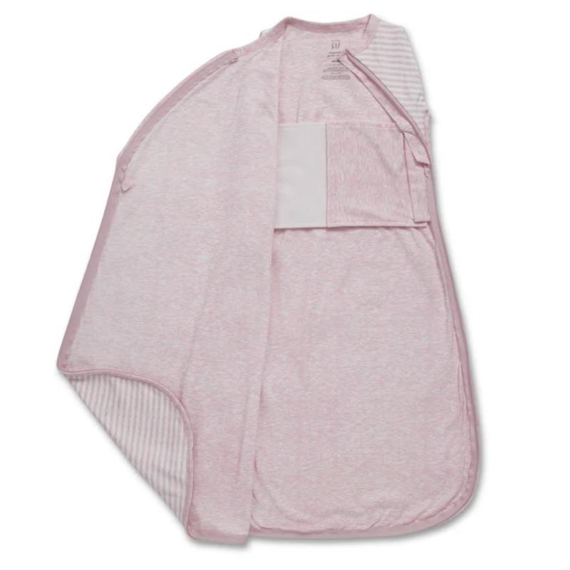 Delta babyGap TrueSleep Sleep Sack in pink, featuring a built-in swaddle and soft fabric, designed for infants.