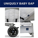 Lightweight grey Delta Gap Classic Umbrella Stroller with striped seat fabric, logo details, and black wheels.