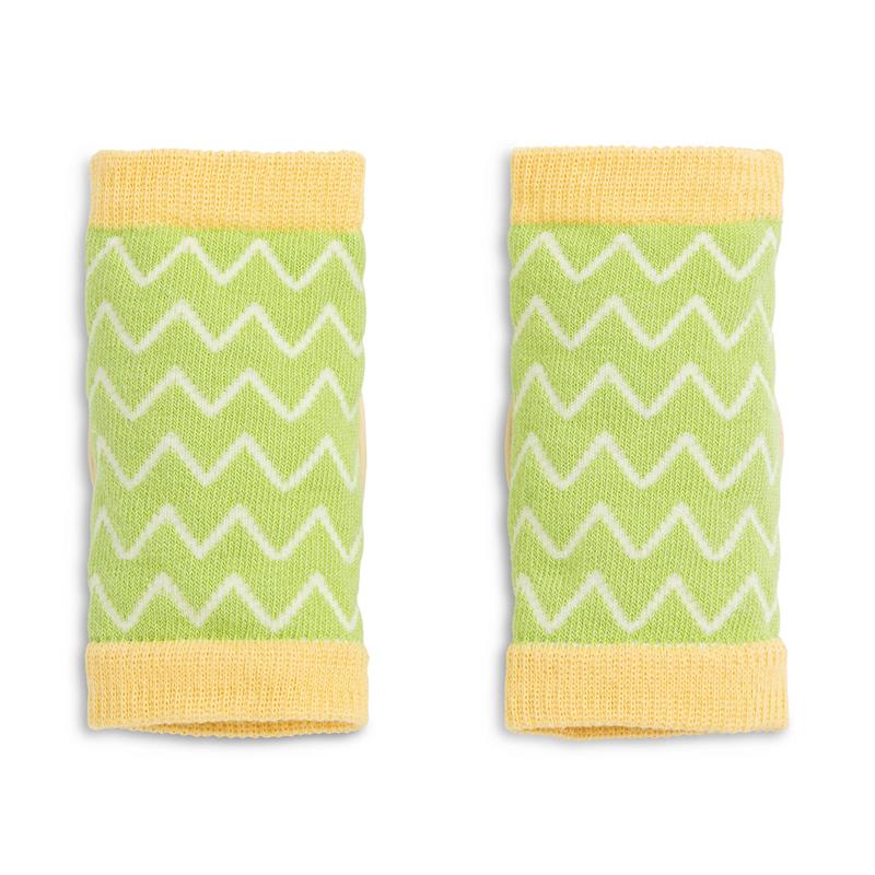 Green and yellow knee pads for infants with a zigzag pattern, designed for protection while crawling.
