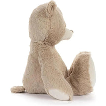 Neutral teddy bear with soft fur, sitting upright, designed as a comforting plush toy for young children.