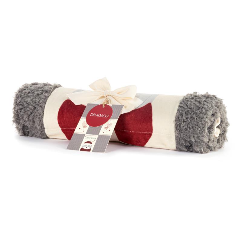 Soft sloth-themed baby blanket by Demdaco, rolled and tied with a ribbon, featuring grey fuzzy edges and a tag.