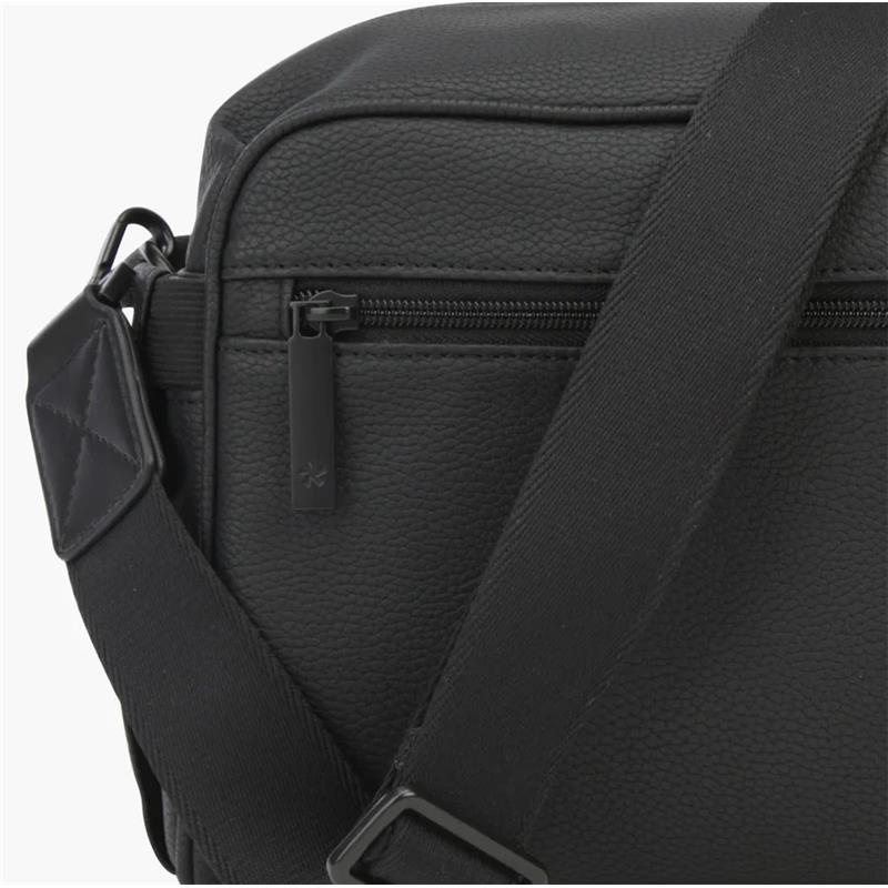 Black DFY - R1 Diaper Bag with textured exterior, zippered closure, and adjustable shoulder strap.