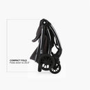 R1 Single Stroller in black, shown in a compactly folded position, highlighting its feature to fold down to 25.5 inches.