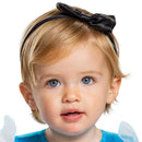 Baby girl wearing a blue and white Disney Alice in Wonderland costume with a black bow headband.
