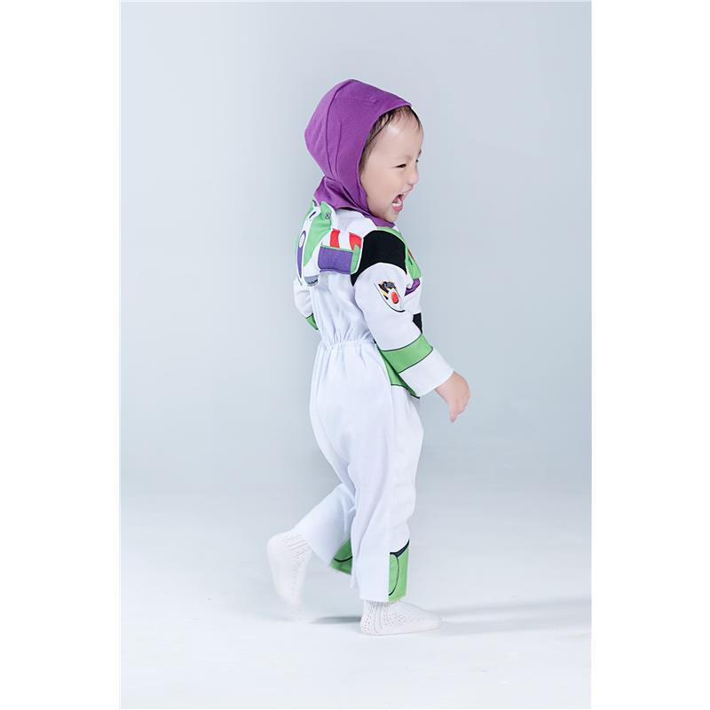 Infant wearing a Buzz Lightyear deluxe costume with a purple hood, smiling and playing, featuring colorful detailing on the suit.
