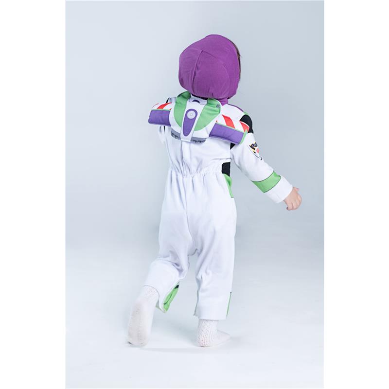 Infant wearing a Buzz Lightyear Deluxe costume, featuring a white jumpsuit with purple and green accents.