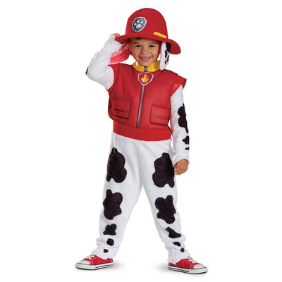 Toddler wearing a Deluxe Paw Patrol Marshall costume, featuring a red fireman hat and spotted white body suit.