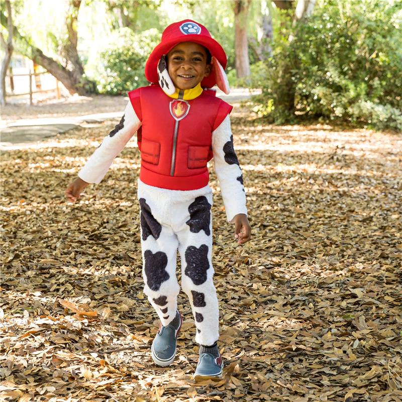 Deluxe Paw Patrol Marshall toddler costume featuring a child in a red vest, spotted pants, and a matching hat in a leafy setting.