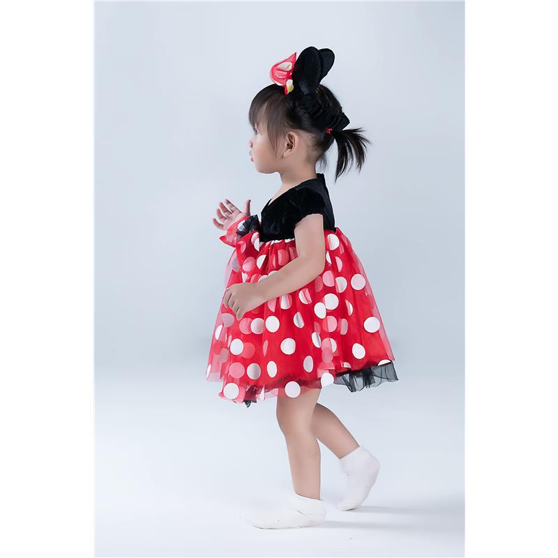 Red Minnie Mouse costume with polka dots and a black top, worn by a young child with an ear headband.