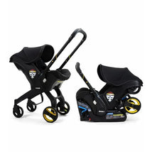 Doona Infant Car Seat with Base and Stroller in Midnight color, featuring a sleek black design and yellow accents.