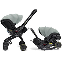 Doona X Infant Car Seat & Latch Base in Dusty Sage, featuring an adjustable canopy, harness, and wheels for easy mobility.