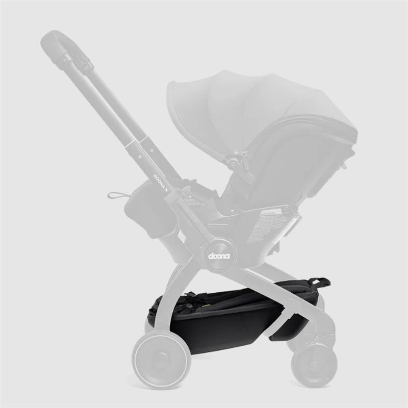 Doona X Pack & Go Basket in black, designed for storage with a sleek, compact design compatible with the Doona stroller.