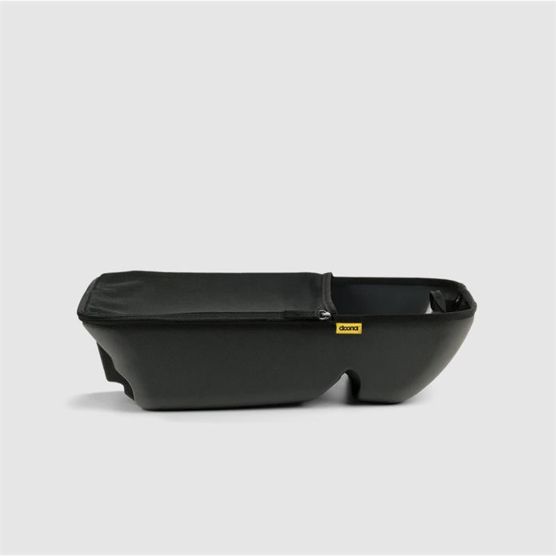 Black Doona X Storage Basket featuring a zippered top, designed for convenient storage with a sleek, minimalist design.