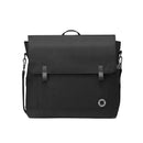 Black Maxi-Cosi diaper bag featuring a fold-over flap, adjustable strap, and a circular logo on the front.