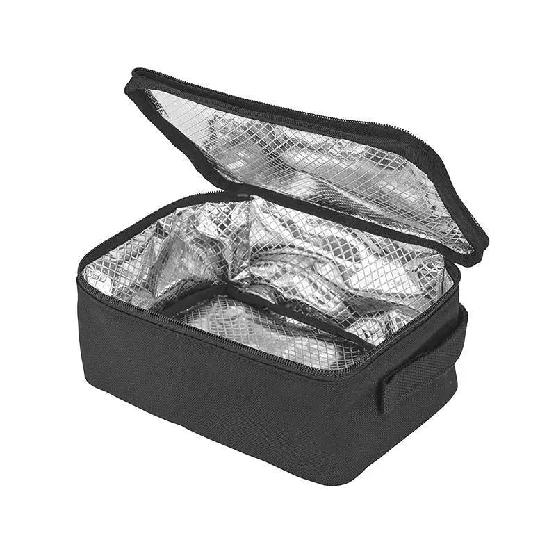 Black Maxi-Cosi diaper bag with zippered opening and silver insulated lining, designed for carrying baby essentials.