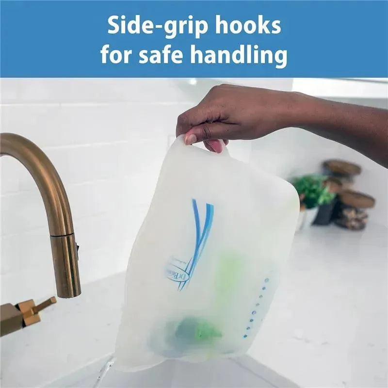 Dr Brown 100% silicone microwave steam sterilizer bag being held over a faucet, highlighting side-grip hooks for safe handling.