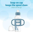 Narrow light blue sippy bottle with silicone handles and snap-on cap, designed for easy grip and spout protection.