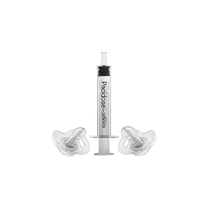 Pacidose pacifier and liquid medicine dispenser by Dr. Brown, featuring a transparent syringe and two clear pacifiers.