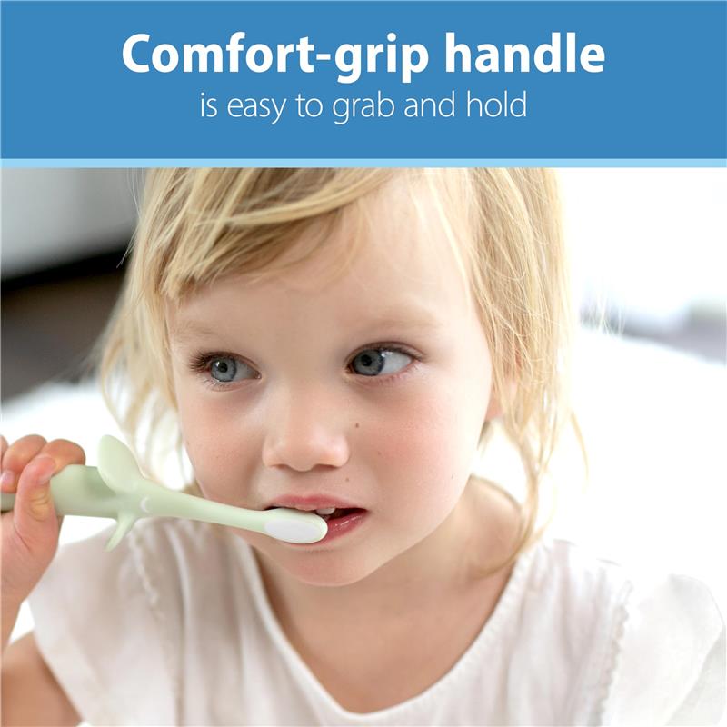 A child using a mint elephant training toothbrush with a comfort-grip handle, promoting easy use for toddlers.