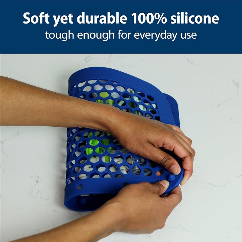 Adjustable blue silicone bag being manipulated by hands, designed for dishwashing use, with visible holes for drainage.