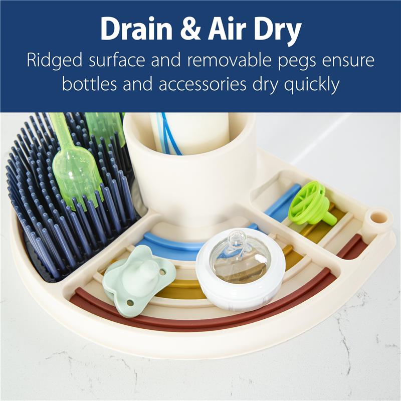 BPA-free silicone drying mat with ridge surface and removable pegs for quick drying of bottles and accessories.