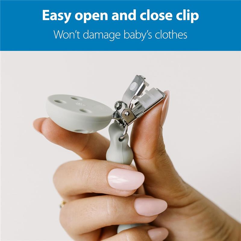 Silicone pacifier clip in pink and ecru, showcasing an easy open and close feature, held by a hand.