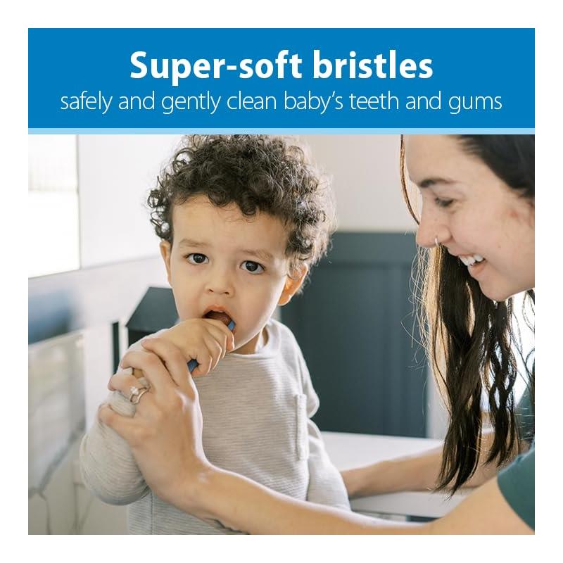 A child with curly hair holds a toothbrush while an adult assists with brushing; super-soft bristles are highlighted for gentle cleaning.