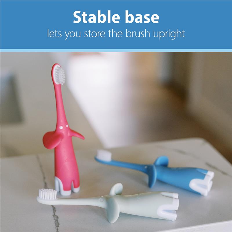 Infant-to-toddler toothbrushes designed as elephants in pink, white, and blue, showcasing stable bases for upright storage.