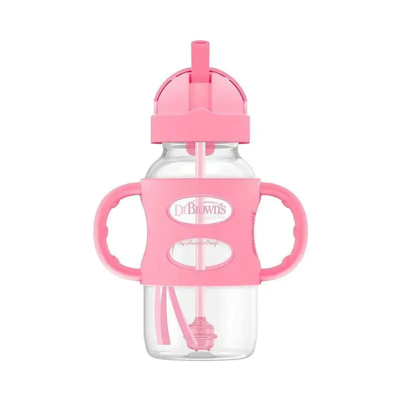 Wide-neck pink sippy straw bottle with silicone handles, designed for toddlers, featuring a clear body and straw.