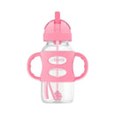 Wide-neck pink sippy straw bottle with silicone handles, designed for toddlers, featuring a clear body and straw.