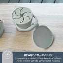 Foldable snack cup in seafoam with a ready-to-use lid, designed to keep snacks fresh and prevent lost lids.