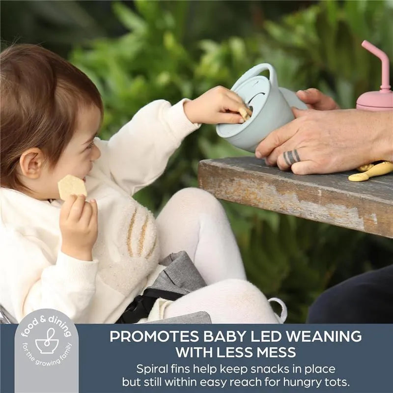 Foldable seafoam snack cup in use; child reaching for snacks. Text highlights benefits for baby-led weaning.