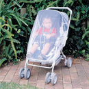 Stroller insect netting draped over a baby stroller with a child inside, surrounded by greenery.