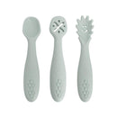 Scoop and Mash utensils in soft seafoam green, featuring a scoop, a twist, and a textured handle, ideal for feeding toddlers.