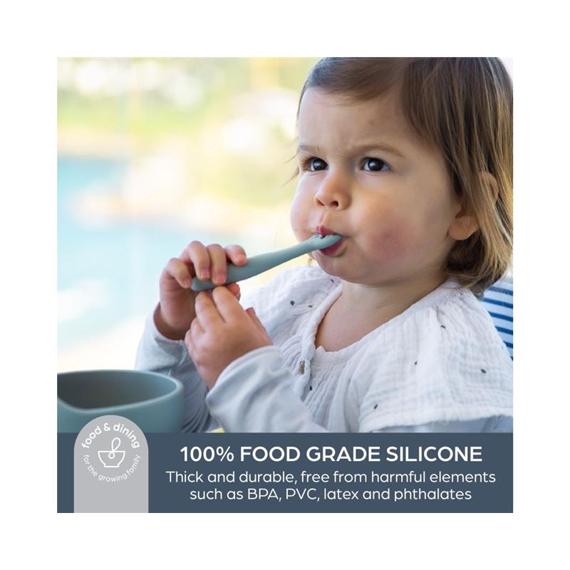 A toddler using a seafoam silicone utensil, with text highlighting its safety and durability features.