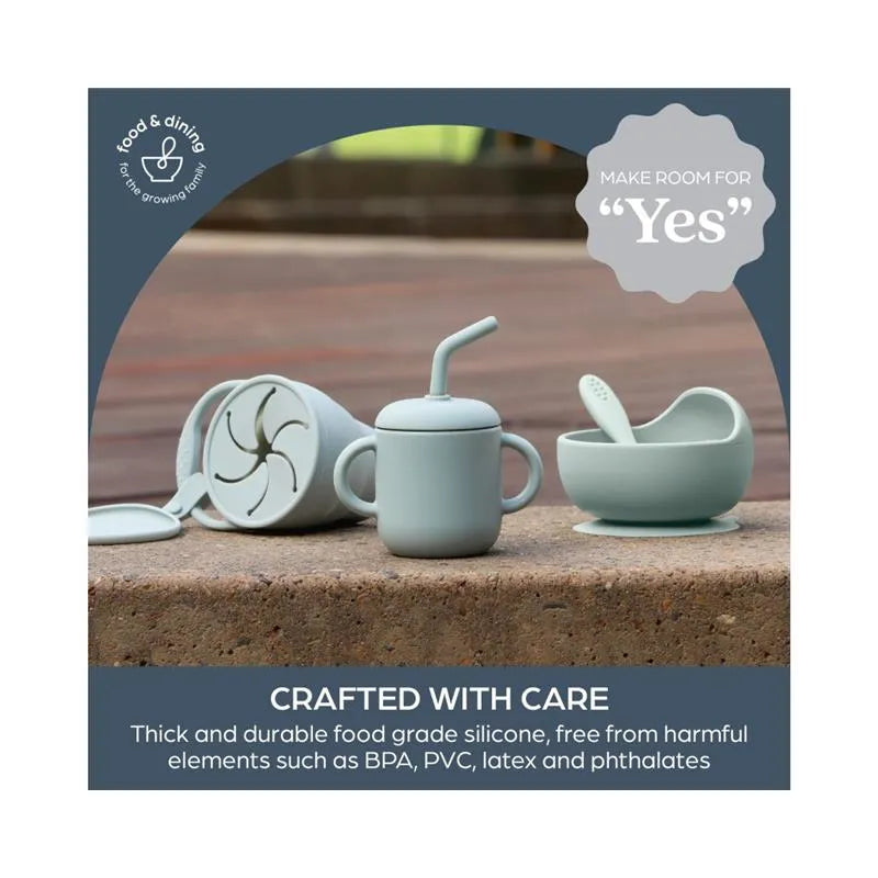 Seafoam suction bowl and toddler cup with straw, made of durable silicone, ideal for mealtime with safety features.