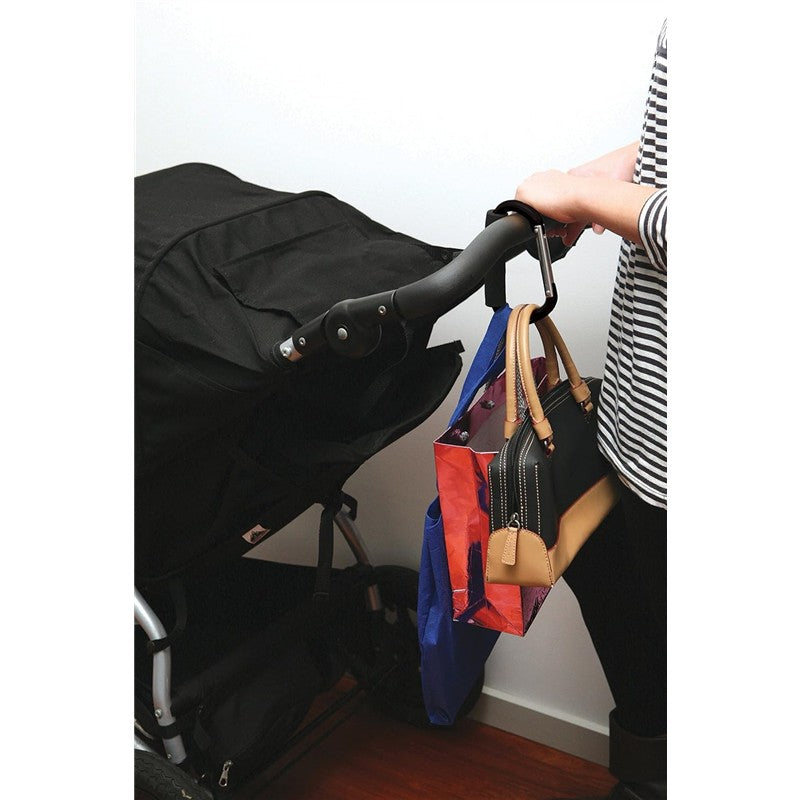 Dreambaby Stroller Hooks holding multiple bags on a stroller handle, featuring a striped shirt and a black stroller.